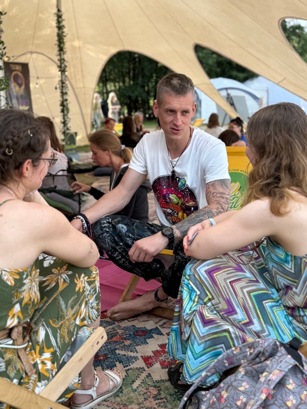 A conversation among the SACRUM team during a workshop